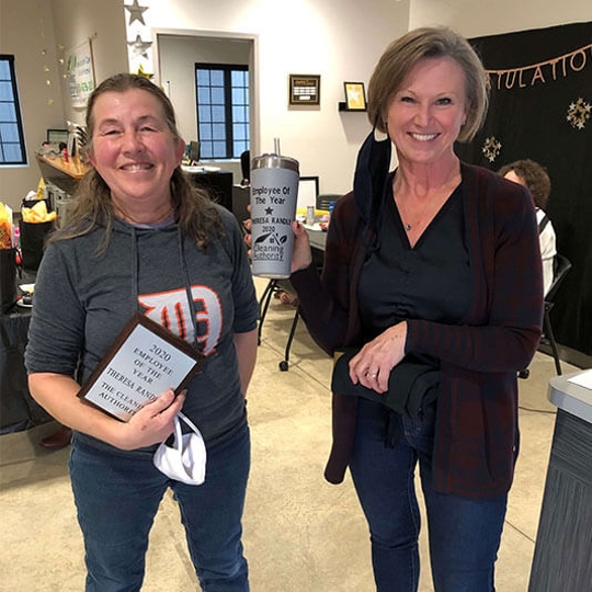 Sherri McArthur Cleaning Authority owner with another woman